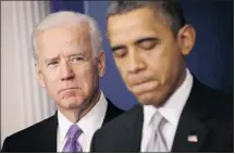  ?? Alex Wong/getty Images ?? U.S. Vice-President Joe Biden, left, listens as President Barack Obama announces an administra­tion-wide effort to solve gun violence.