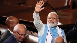  ?? Drew Angerer/getty Images ?? Indian Prime Minister Narendra Modi waves as he departs after delivering remarks to a joint meeting of Congress at the U.S. Capitol on June 22, 2023, in Washington, D.C.