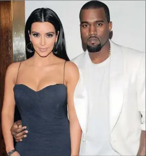  ??  ?? When we look at the lifestyle choices of Kim Kardashian and her husband, Kanye West, do we see racial and economic progress or obscene wastefulne­ss?