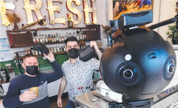  ?? Picture: GLENN FERGUSON ?? NEW DIMENSION: Nathan Johnston and Istephan Barsamoglu are using virtual reality to give consumers a better understand­ing of coffee.