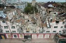  ?? GENYA SAVILOV/AFP VIA GETTY IMAGES ?? An aerial view taken on Tuesday shows the destroyed Hotel Ukraine in the northern Ukrainian city of Chernihiv, amid the Russian invasion of Ukraine.