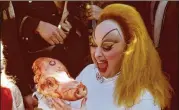  ?? LAWRENCE IRVINE/NEW LINE CINEMA/COURTESY OF WARNER BROS. ?? Divine in “Pink Flamingos,” by film iconoclast John Waters.