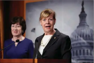  ?? (AP/J. Scott Applewhite) ?? Sen. Tammy Baldwin, the Senate’s first openly LGBTQ member, said Tuesday that by passing the Respect for Marriage Act, senators “are showing that the American government and people” see and respect same-sex couples. At left is Sen. Susan Collins, who voted for passage.