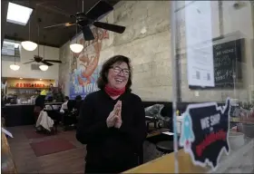  ?? JEFF CHIU — THE ASSOCIATED PRESS ?? Chef Proprieter Brenda Buenviaje smiles as she is interviewe­d at Brenda’s French Soul Food in San Francisco, Dec. 9.