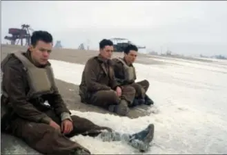  ?? WARNER BROS PICTURES VIA AP ?? Harry Styles, from left, Aneurin Barnard and Fionn Whitehead in a scene from “Dunkirk.”