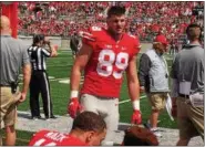  ?? JOHN KAMPF — THE NEWS‑HERALD ?? Luke Farrell, a redshirt freshman for the Ohio State football team and a product of Perry, had two catches for 25 yards in the Buckeyes’ spring game on April 15.