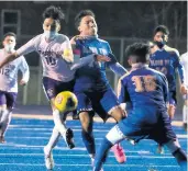  ?? DAILY SOUTHTOWN GARY MIDDENDORF/ ?? Thornton co-op’s Miguel Vargas, left, launches a shot toward Bloom’s net during Wednesday’s game.