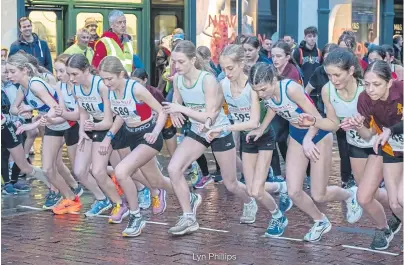  ?? ?? Action from the senior girls’ race at the final night of the Chichester Corporate Challenge | Picture: Lyn Phillips