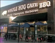  ?? Arkansas Democrat-Gazette/JENNIFER CHRISTMAN ?? Whole Hog Cafe’s newest west Little Rock location features patio seating.