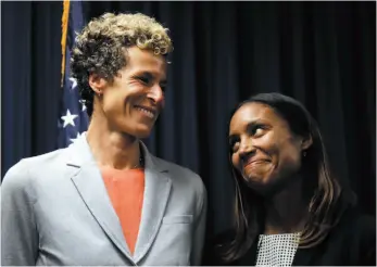  ?? AP PHOTO ?? Accuser Andrea Constand, left, reacts at a news conference with prosecutor Kristen Feden after Bill Cosby was sentenced to three to 10 years for sexual assault on Tuesday in Norristown, Pa.