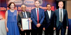  ??  ?? Business Management School (BMS ) President received the formal documentof launching BSc (Hons) Banking and Finance degree of Northumbri­a University UKin Sri Lanka from Pro Vice Chancellor of Northumbri­a University UK .