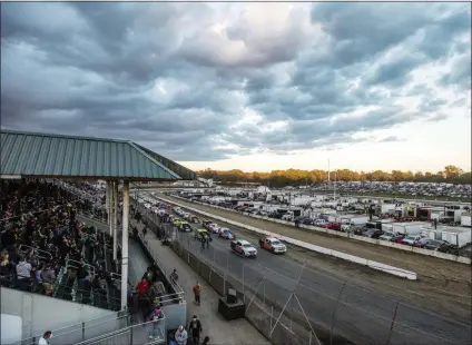  ?? KELLY MARSH - ASSOCIATED PRESS ?? In this Oct. 18, 2018, photo, drivers are lined up on the track for the start of the small-block modified feature race during the 57th annual Eastern States Weekend races at the Orange County Fair Speedway in Middletown, N.Y.