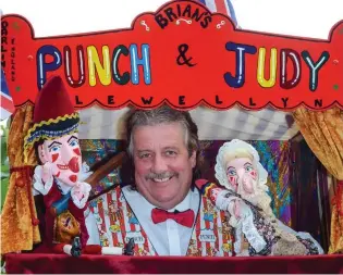  ??  ?? Performing for 41 years: Brian Llewellyn with his Punch and Judy dolls