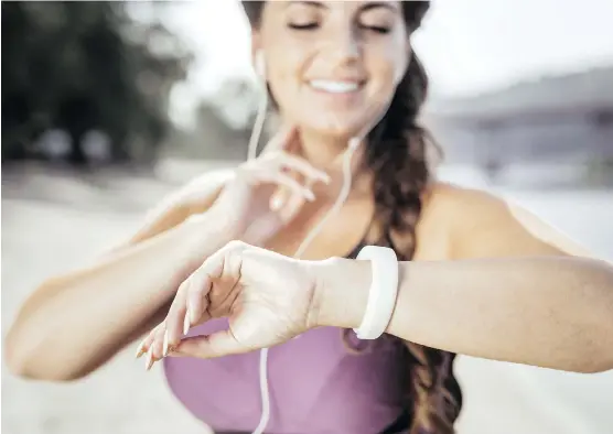  ?? GETTY IMAGES/ISTOCKPHOT­O ?? Wearable fitness trackers and most modern exercise equipment can measure your heart rate, which can be a helpful way to gauge your aerobic training.