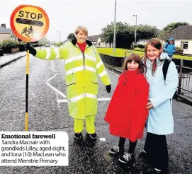  ??  ?? Emotional farewell Sandra Macnair with grandkids Lilley, aged eight, and Iona (10) MacLean who attend Menstrie Primary