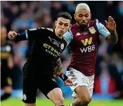  ?? ANDY HOOPER ?? Holding his own: Phil Foden (left) battles for the ball with Douglas Luiz at Wembley