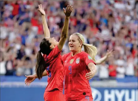  ?? ASSOCIATED PRESS ?? UNITED STATES’ CHRISTEN PRESS (LEFT) CELEBRATES with United States’ Lindsey Horan after scoring her side’s first goal during Tuesday’s Women’s World Cup semifinal soccer match between England and the United States at the Stade de Lyon, outside Lyon, France.