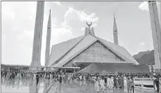  ??  ?? ISLAMABAD
A large number of faithful coming out after offering Namaz-e-Jumma Tul Vida at Faisal Masjid during Holy Fasting Month of Ramzanul Mubarak. -APP