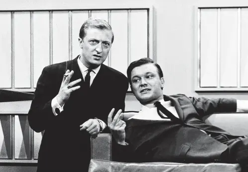  ??  ?? Television stars Graham Kennedy and Bert Newton. Kennedy enjoys a fag while Newton shares his opinion of 21st-century social-media “critics”.