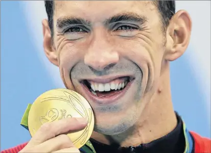  ?? ASSOCIATED PRESS FILE PHOTO ?? Michael Phelps is the most decorated Olympian of all time, with 28 medals.