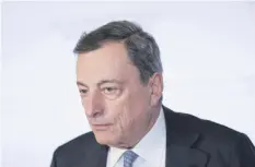  ?? Bloomberg ?? ECB chief Mario Draghi has announced the end of QE