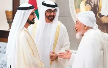  ?? Courtesy: Dubai Media Office ?? Above: Shaikh Mohammad Bin Rashid and Shaikh Mohammad Bin Zayed with Shaikh Abdullah Bin Bayyah, chairman of the Emirates Fatwa Council, during an Eid Al Adha reception at Mushrif Palace in Abu Dhabi yesterday.