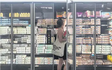  ?? NYT ?? A shopper at a grocery store in New York City.