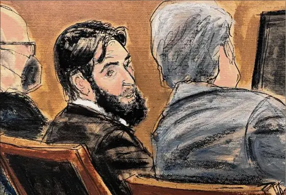  ?? Elizabeth Williams / Associated Press ?? In this courtroom sketch, Sayfullo Saipov, center, speaks with one of his defense attorneys prior to the beginning of summations in the penalty phase off his trial in federal court in New York on Tuesday.
