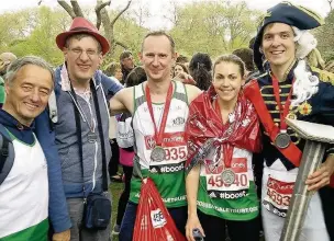  ??  ?? ●● Steve Nicholls, Stevie Nicholson, Karl Downing, Janice Atkins and Phil Damerell ran the London Marathon for Rossendale Trust