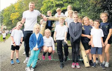  ??  ?? St Bartholome­w’s C of E Primary School, in Quorn, were delighted to welcome Adam Peaty MBE, World and Olympic swimming champion to open the new activity trail, called Bart’s Badger Trail.