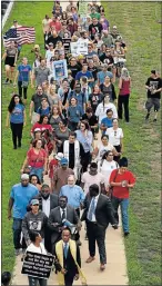  ?? Picture: REUTERS ?? TAKING A STAND: Participan­ts in the 10-day Charlottes­ville to DC: The March to Confront White Supremacy arriving in Washington DC from Charlottes­ville, Virginia