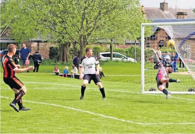  ?? ?? Clincher Ross Macfarlane scores Doune’s fourth goal on Saturday