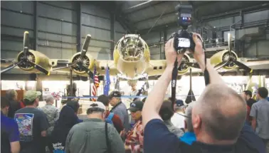  ?? TY GREENLEES / DAYTON DAILY NEWS ?? The National Museum of the U.S. Air Force staff and volunteers worked 55,000 hours to restore the iconic World War II bomber Memphis Belle.