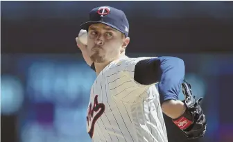  ?? AP PHOTO ?? BRING IT ON HOME: Twins starter Jake Odorizzi delivers a pitch during his winning outing against Cincinnati that ended Minnesota’s eight-game slide yesterday in Minneapoli­s.