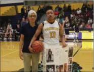  ?? SUBMITTED ?? Constance Chaplin of Euclid shown with Coach Lynn Phillips after scoring her 1,000th point. Heading into the tournament this week, Chaplin is Euclid’s all-time leading scorer with more than 1,600 points.