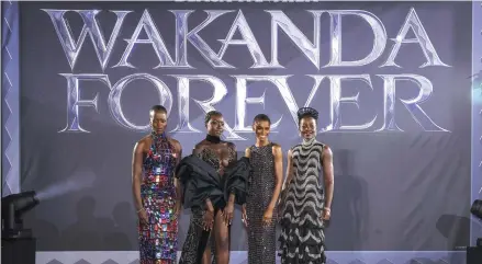  ?? VIANNEY LE CAER/INVISION ?? Florence Kasumba, from left, Danai Gurira, Letitia Wright and Lupita Nyong’o at a Nov. 3 premiere of“Black Panther: Wakanda Forever.”