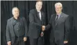  ?? JASON PAYNE/PNG ?? Vancouver Giants owner Ron Toigo, left, with general manager Scott Bonner and head coach Lorne Molleken, is unhappy with the high rent his team pays.