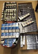  ??  ?? SEIZED: Counterfei­t cigarettes found at the home of Bryar Ahmad.