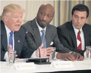  ??  ?? President Donald Trump speaks during a meeting with manufactur­ing CEOs in the Roosevelt Room of the White House on Thursday. From left are, Trump, Merck &amp; Co CEO Kenneth Frazier, and Ford Motor Co CEO Mark Fields.