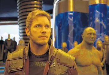  ?? Marvel Studios ?? CHRIS PRATT, left as Star-Lord, appears in “Guardians of the Galaxy Vol. 2” with Dave Bautista as Drax.