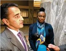  ?? J. SCOTT TRUBEY/STRUBEY@AJC.COM ?? Attorney Ash Joshi (left) and his client, Francine Williams, a former Atlanta police public affairs employee, appear after a Civil Service Board hearing Wednesday at City Hall.