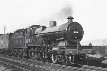  ??  ?? About three miles out from Skipton, beautifull­y turned out LMS Compound No 926, its lined-out crimson lake livery polished to perfection, works the up ‘Thames-Forth Express’ near Cononley on Saturday, 5 March 1938. The ‘Thames-Forth Express’ was a joint LMS and LNER train that ran between Edinburgh (Waverley) and London (St Pancras) between 26 September 1927 and 9 September 1939, and post-war it was finally reintroduc­ed by British Railways (London Midland Region) as ‘The Waverley’ in 1957. No 926 entered traffic in May 1927 from the Vulcan Foundry (Works No 4024) and, like No 931 already seen, it is recorded after the LMS fitting of exhaust injectors. This 4-4-0 would finally be withdrawn from Crewe North shed as British Railways No 40926 in August 1957.