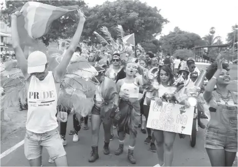  ??  ?? As Diana Ross’ “I’m Coming Out” blasted from the sound system, members of the local LGBT community (Photo by Terrence jubilantly affirmed their existence at Guyana’s first Pride Parade yesterday. Thompson)