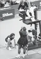  ?? BEN SOLOMON THE NEW YORK TIMES ?? Serena Williams of the U.S. confronts Carlos Ramos, the chair umpire, during the U.S. Open women’s singles final.