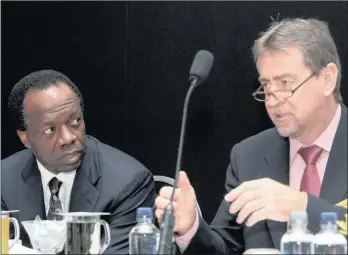  ?? PHOTO: SIMPHIWE MBOKAZI ?? FirstRand chief executive Sizwe Nxasana (left) is to step down from his position as chief executive in October and will be succeeded by his deputy, Johan Burger (right).