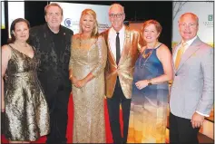  ?? (NWA Democrat-Gazette file photo/Carin Schoppmeye­r) ?? Mary and Fred Scarbrough, Arkansas Children’s Foundation president; Mandy Macke, Color of Hope Gala chairwoman; Johnny Mike Walker, gala champion sponsor; and Marcy Doderer, Arkansas Children’s president and CEO and husband Mark welcome guests to the 2019 gala for Arkansas Children’s Northwest. Macke is the AFP 2020 Outstandin­g Volunteer Fundraiser.