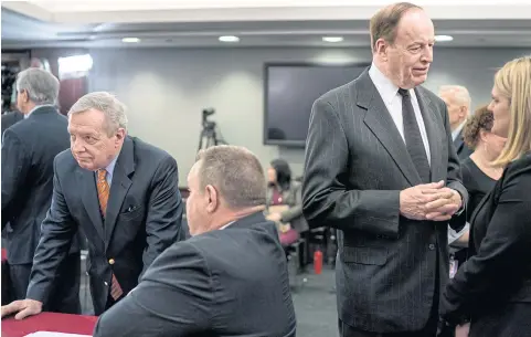  ?? NYT ?? An image of, from left, Senators Dick Durbin, Jon Tester, and Richard Shelby as they speak to aides on Capitol Hill last month.