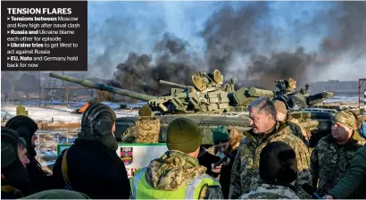  ?? AFP ?? &gt; Tensions between &gt; Russia and &gt; Ukraine tries &gt; eU, nato Ukrainian President Petro Poroshenko talking with tankmen during drills near the city of Chernihiv, northern Ukraine. —