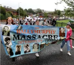  ??  ?? Landmark year: Relatives of the Ballymurph­y victims march