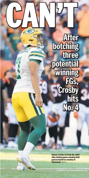  ?? GETTY ?? Mason Crosby (2) feels the relief after kicking game-winning field goal on fourth try Sunday in Cincinnati.